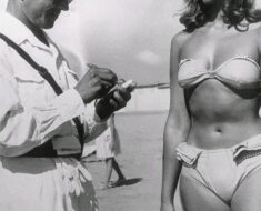 At first glance, it looks like a harmless photo of a woman on the beach, Look closer, though, and you will see the hidden detail that caused this picture to go viral