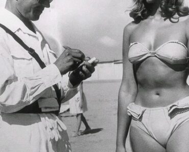 At first glance, it looks like a harmless photo of a woman on the beach, Look closer, though, and you will see the hidden detail that caused this picture to go viral